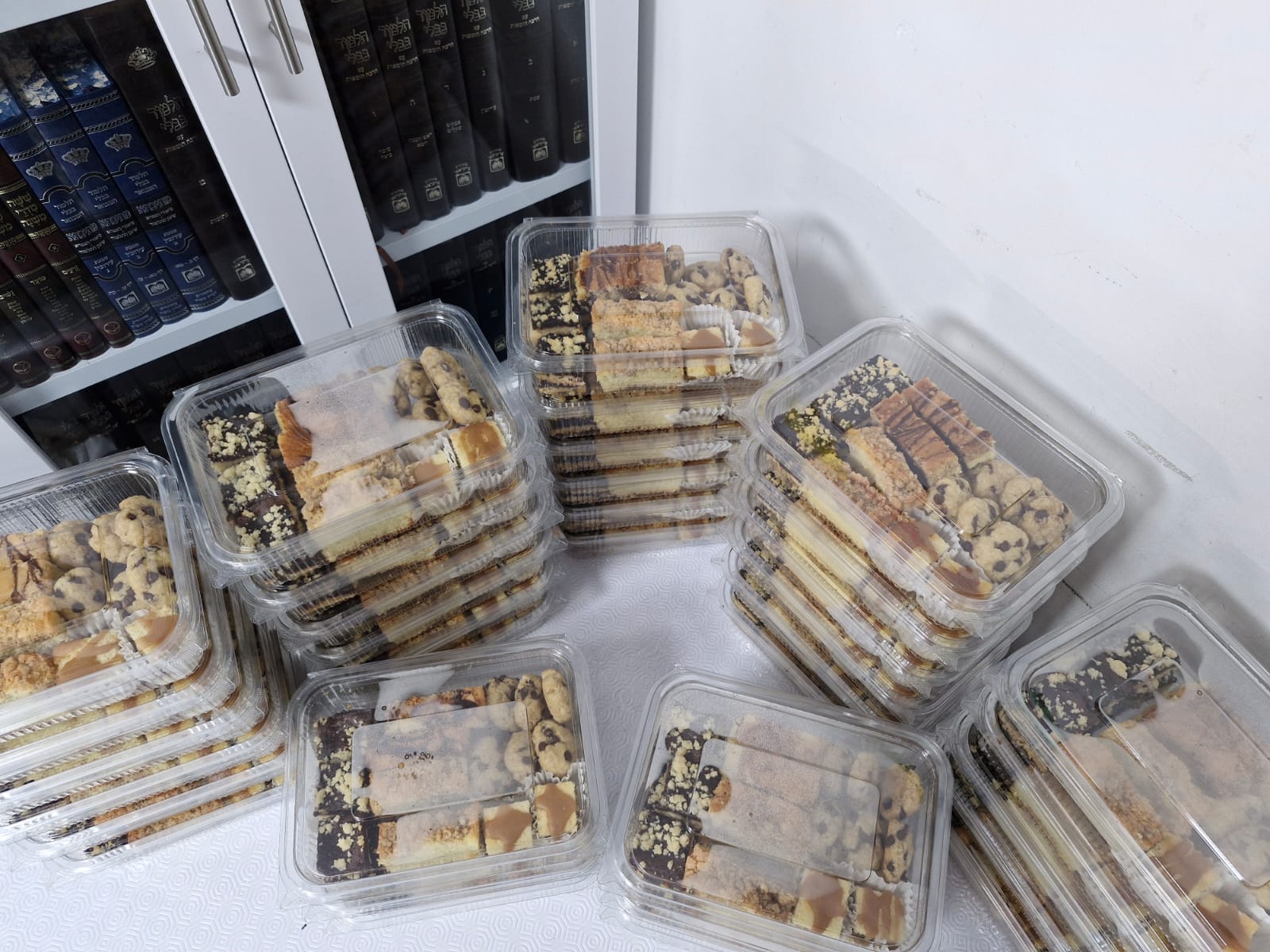 Assorted cakes and cookies packaged for Erev Pesach