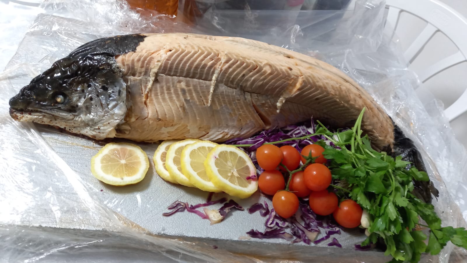 A whole fish prepared for the Purim seudah