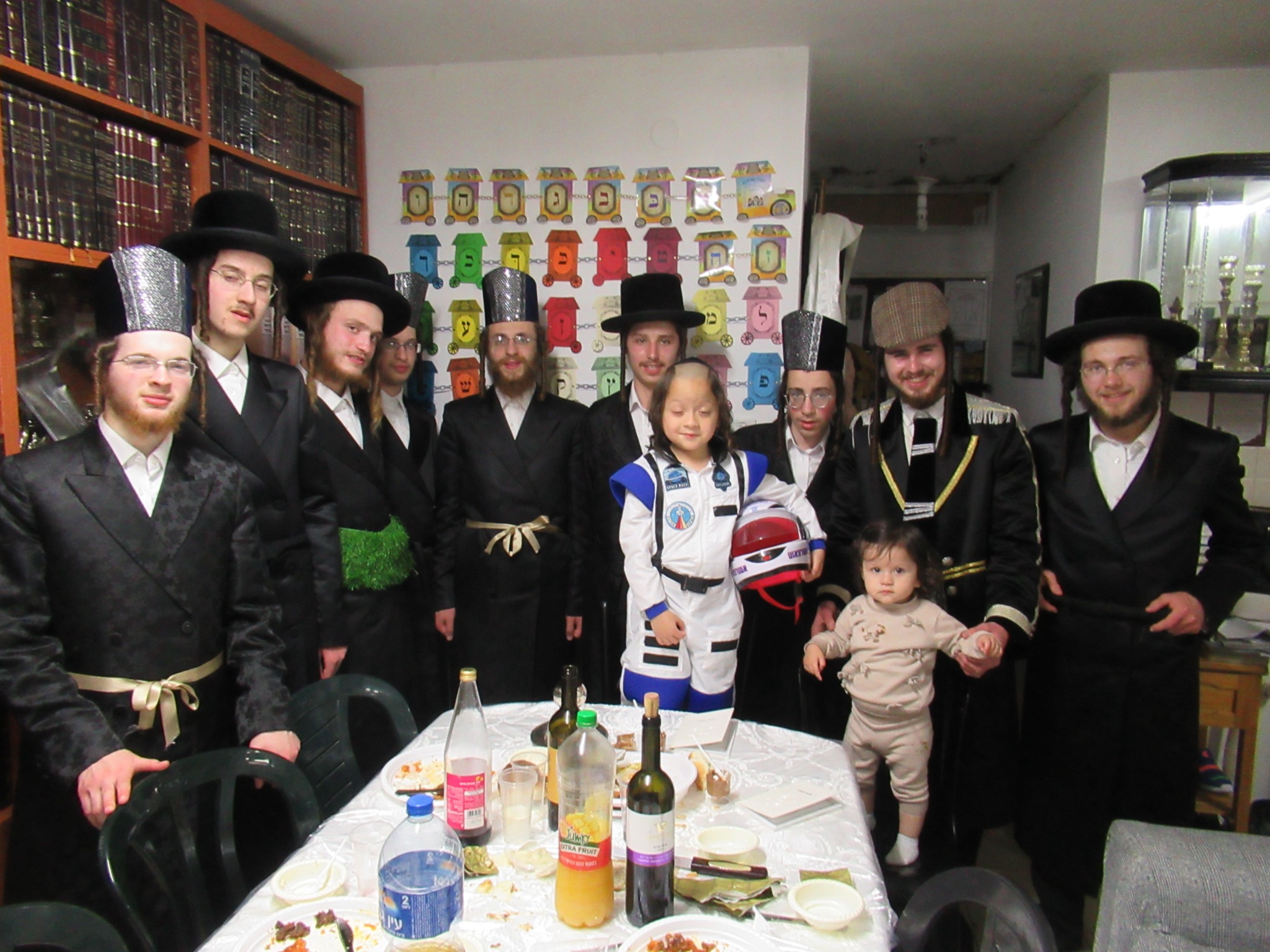 A group of guests together after a Purim seudah