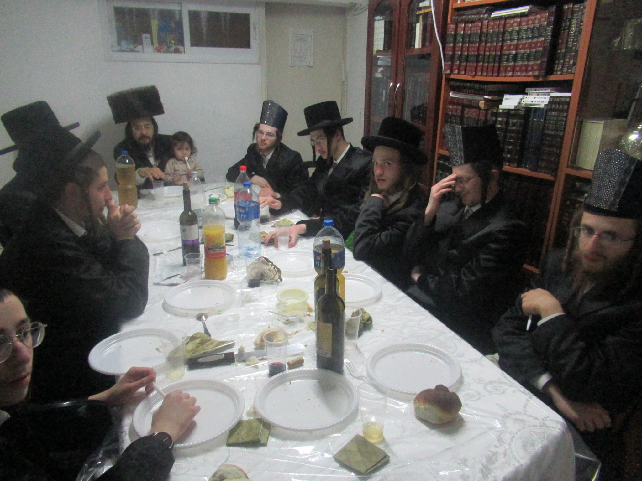 Guests gathered around the table during another Purim seudah